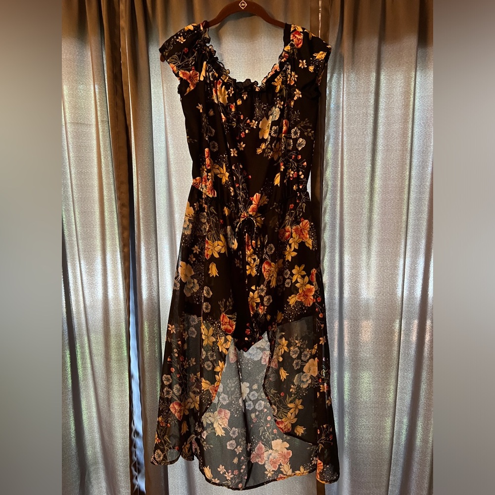 Beautiful floral print dress with built in shorts.
